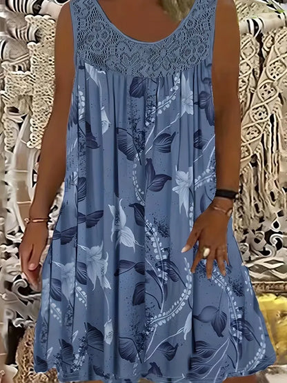 Elegantna maksi haljina za žene većih veličina s okruglim izrezom, bez rukava, čipkom, nabranim uzorkom i patchwork uzorkom.