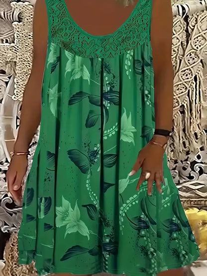 Elegantna maksi haljina za žene većih veličina s okruglim izrezom, bez rukava, čipkom, nabranim uzorkom i patchwork uzorkom.